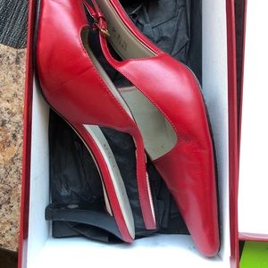 Red high heel open back strap shoes